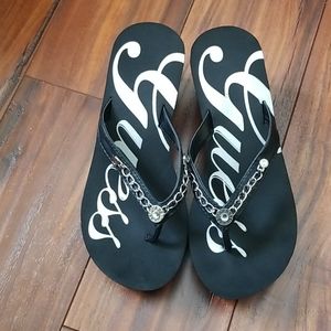 Guess platform flip flops